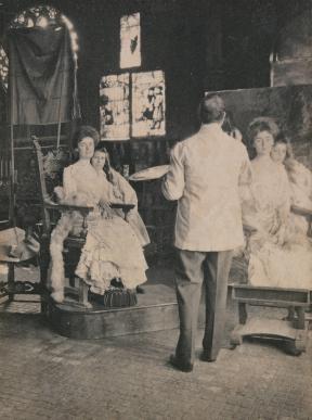 John Singer Sargent paints a portrait of Mrs. Fiske Warren and her daughter who are posed in his studio.