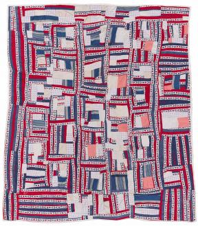 Red, white, and blue quilt made from pieced strips of solid and printed ("Vote") cotton.