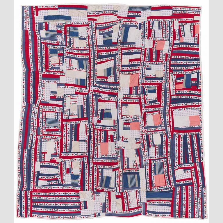 Red, white, and blue quilt made from pieced strips of solid and printed ("Vote") cotton.