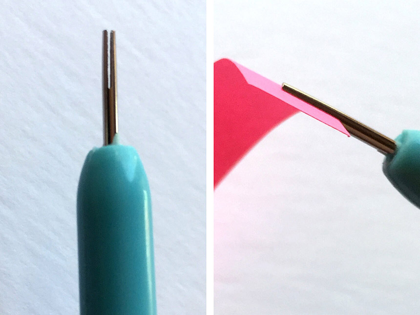 close-up of quilling tool tip, and paper inserted into quilling tool tip