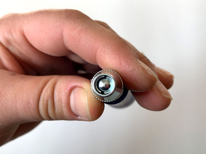 metal head of linoleum cutter where the blade is inserted