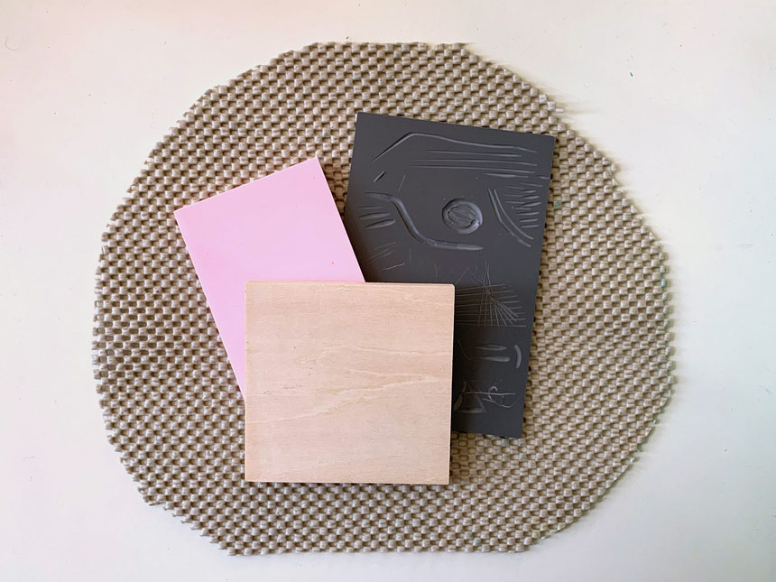 Examples of materials that may be used to create relief block: wood, fiberboard, and linoleum