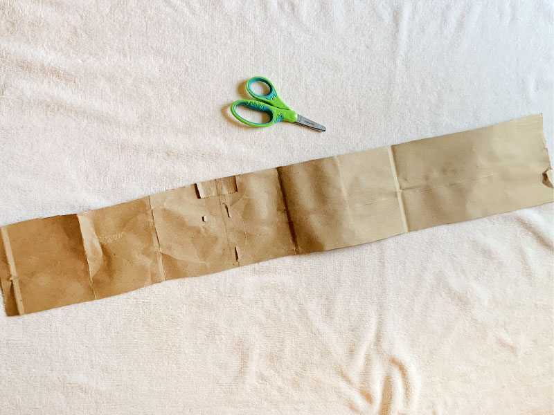 Long strip of paper cut from paper bag