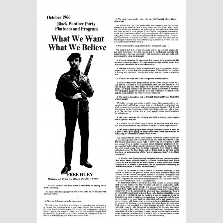 A newspaper spread featuring a man in a beret holding an automatic weapon on the lefthand column and text on the right side.