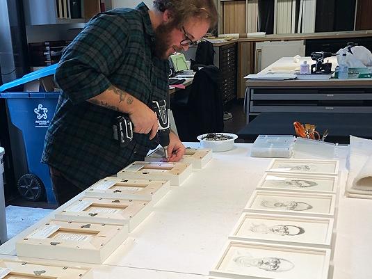 Framing of 21 drawings from the same series