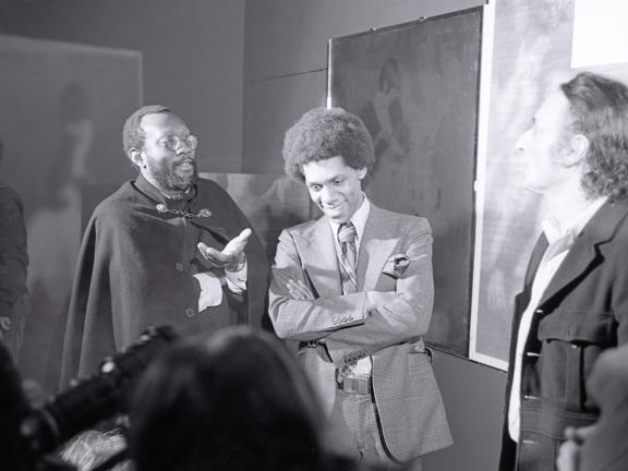 Frank Bowling and others at the opening of "Some American History" at the Menil Collection in Houston, Texas.