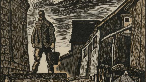 A black-and-white, highly stylized image of a man on a dock in front of fish houses and an overcast sky.