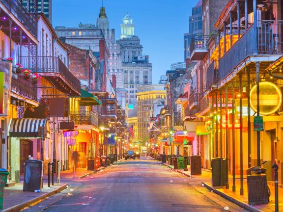 New Orleans istock:   Save Try Edit Bourbon Street, New Orleans, Louisiana, USA Bourbon St, New Orleans, Louisiana, USA cityscape of bars and retaurants at twilight. New Orleans Stock Photo  Description Bourbon St, New Orleans, Louisiana, USA cityscape of bars and retaurants at twilight.