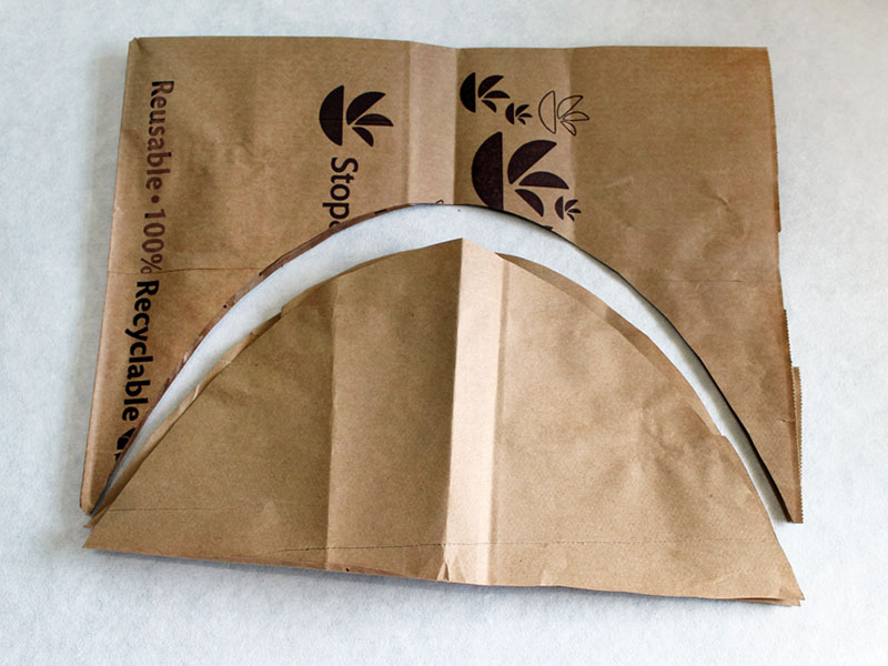 large half circle cut from paper bag