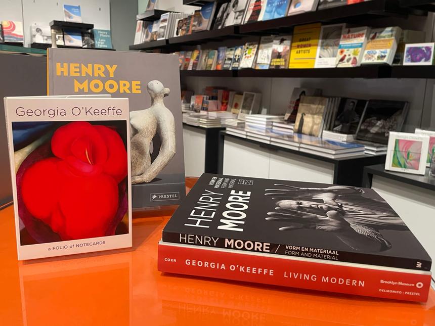 Arrangement of books related to Georgia O'Keeffe and Henry Moore on table in MFA bookstore