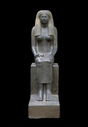 Large gray statue of seated woman