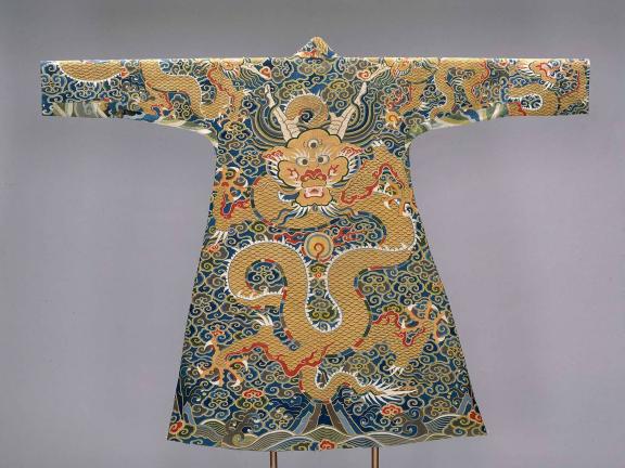 Tapestry-woven robe with large gold dragon on front and back, ground covered with blue and green clouds 