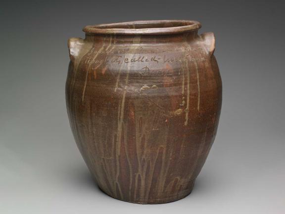 brown ceramic jar