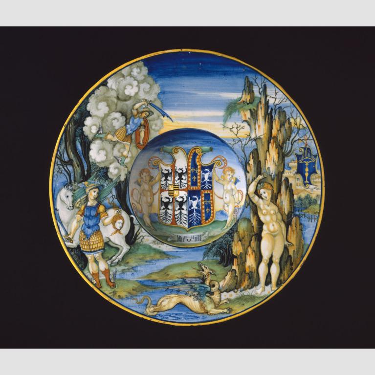 A painted plate depicting the myth of Perseus and Andromeda on the edge with the artist's coat of arms in the middle. 