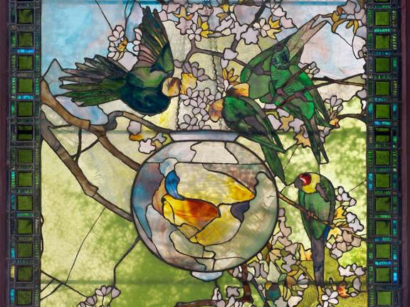 Stained glass window designed by Louis Comfort Tiffany depicting Parakeets and Gold Fish Bowl, about 1893