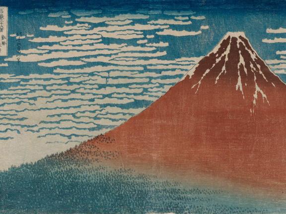 Print depicting a red mountain and blue sky with wispy clouds