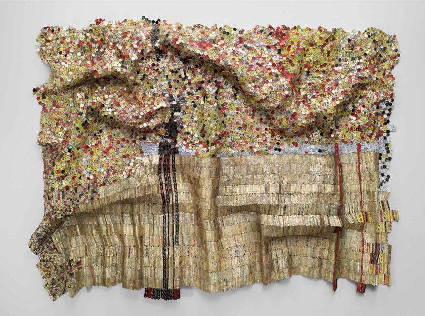 Gold tapestry made from bottle caps and foil