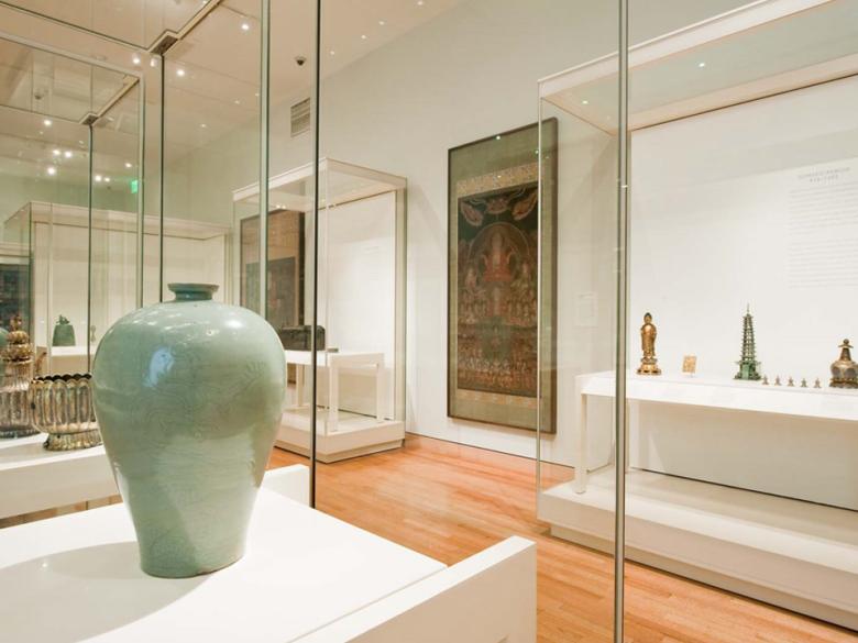 View of Arts of Korea gallery with large green vase in foreground
