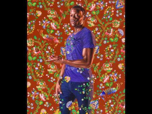 portrait of a man with a floral background