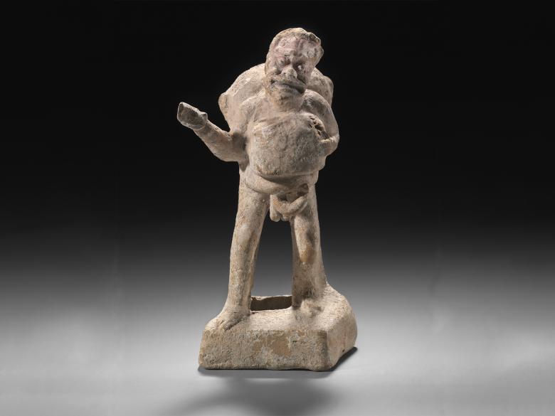 Sculpture of an actor playing a wandering man with baggage