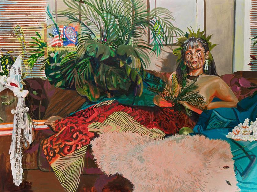A figure wrapped from the waist down in a red patterned textile reclines surrounded by green plants.