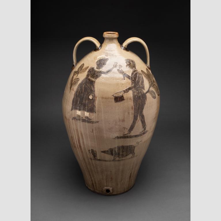 A beige stoneware watercooler jug with two handles, a small opening, and decorated with the figures of two people and a pig. 
