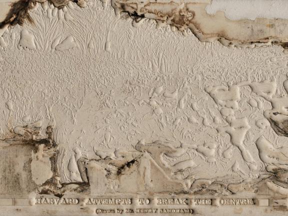 A papier-maché mold of a Harvard-Yale football game from 1891.