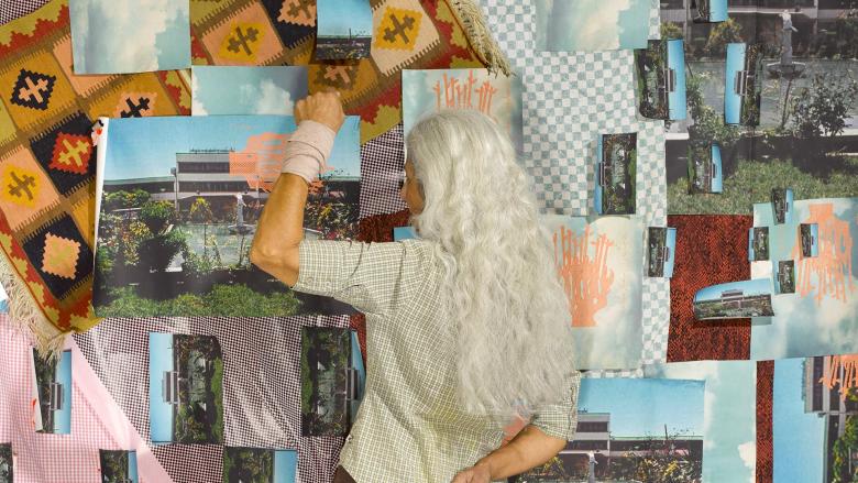 Artist Sheila Soleimani works on "Dissident," her piece that combines photo and fabric material. 