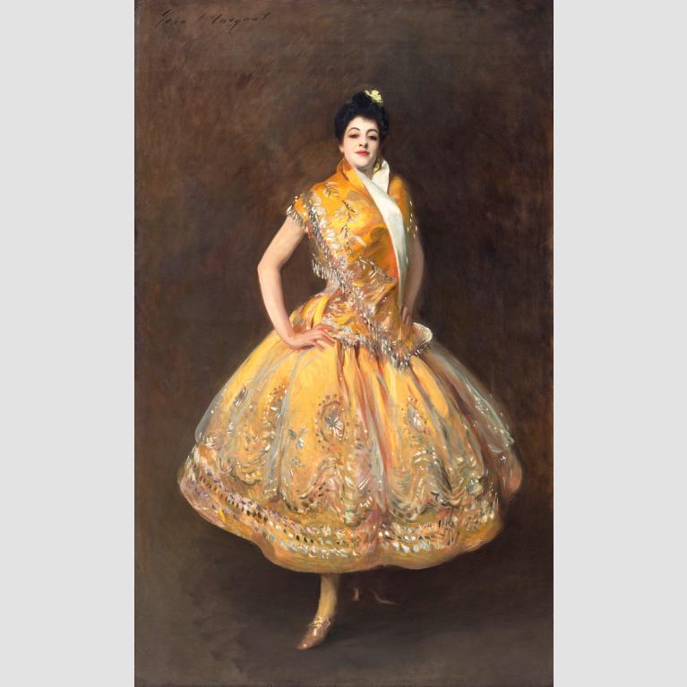 A portrait of the Spanish dancer Carmen Moreno in a yellow, beaded dress. 