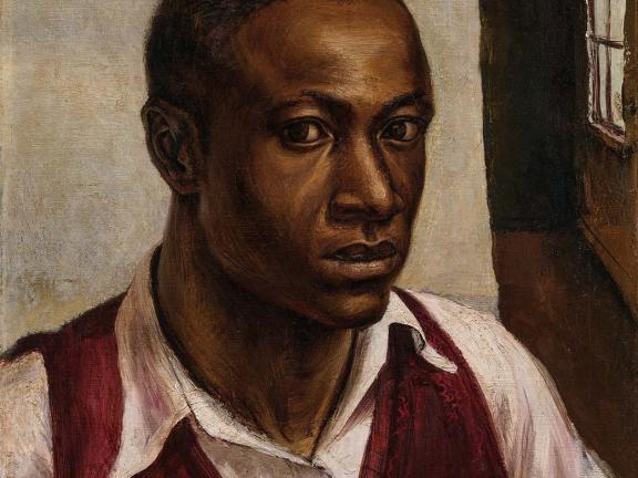 A portrait of a man in a white collared shirt and red sweater vest staring directly ahead.