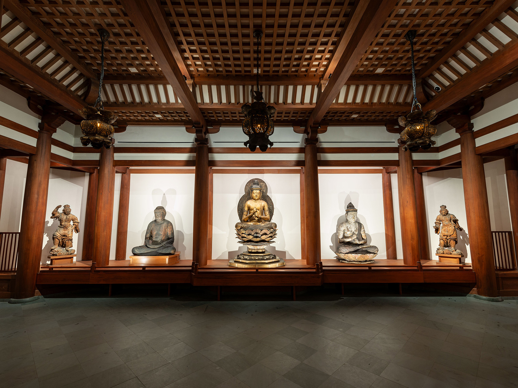 Wide-angle photo of the Japanese Buddhist Temple Room with several sculptures
