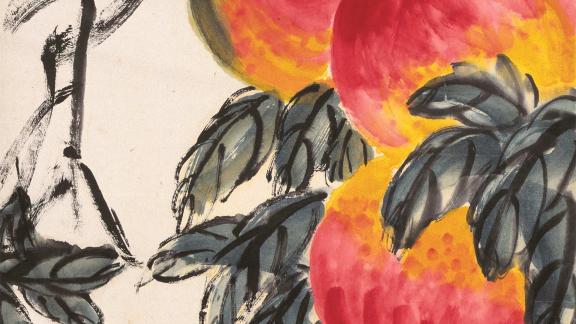 Stylized cluster of peaches on a branch with leaves.