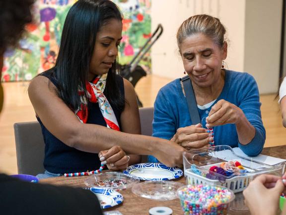 Two women art-making