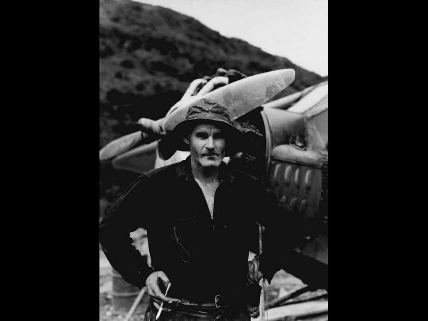 Bradford Washburn's photograph, Bob Reeve with his Ever-present Cigarette and Holder, Valdez Mudflats, Alaska