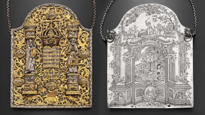 A composite image of the golden front and silver back of an ornate and intricately-detailed Torah shield inlaid with stones.